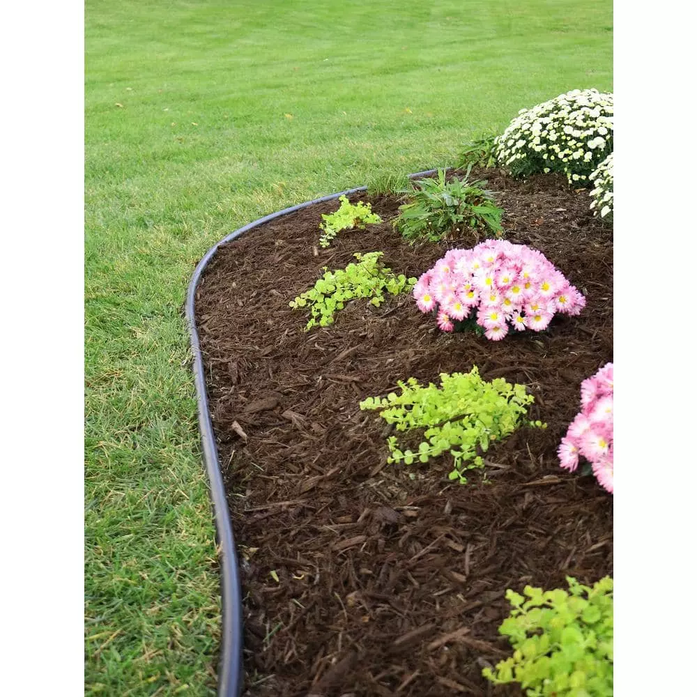 Vigoro 60 ft. x 0.5 in. x 4.5 in. Black Plastic Lawn Edging 9 Vigoro 60 ft. x 0.5 in. x 4.5 in. Black Plastic Lawn Edging - Image 7